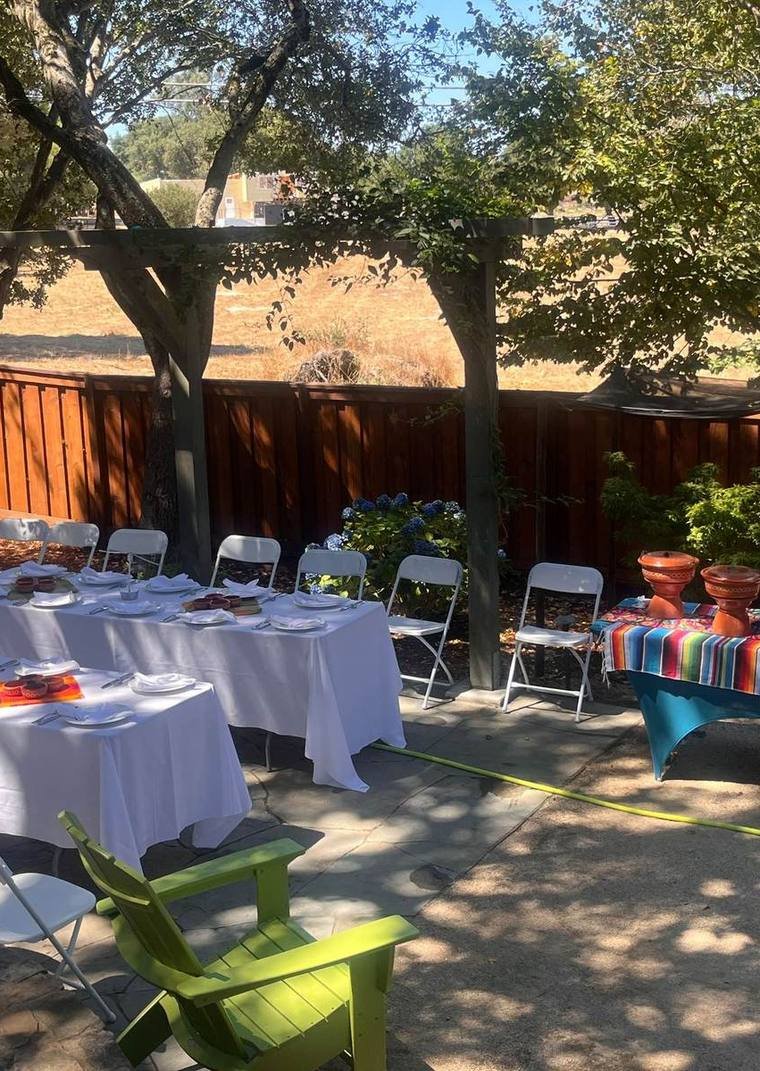 Tables set for an event reception with Taco Man catering